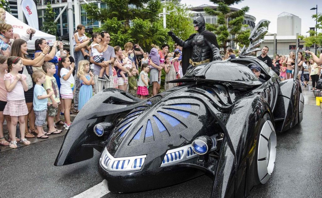 Batman arrives in his bat mobile. Batman arrives in his bat mobile.