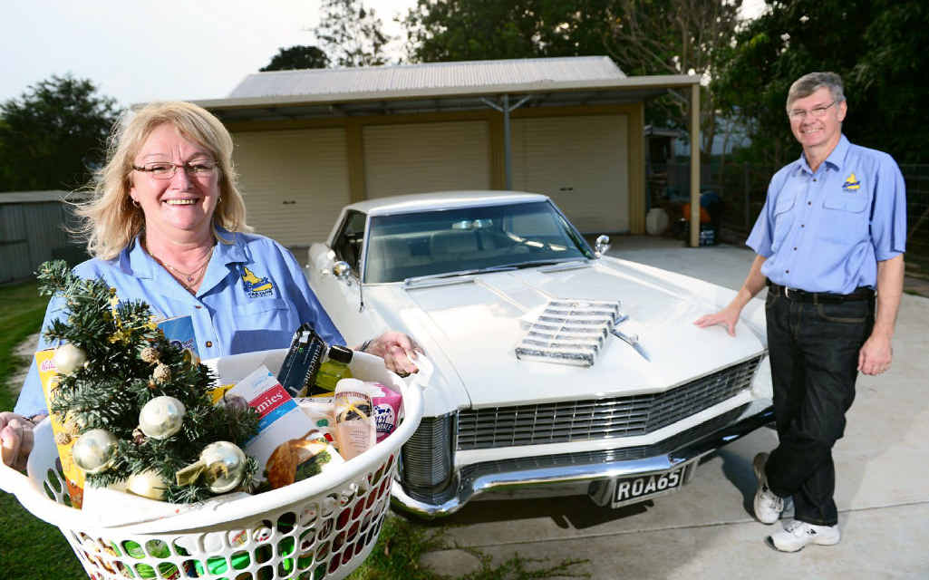 HELPING HAND: Buick Car Club of Australia members Laurene and John Forster of Woodend are supporting the Adopt-a-Family appeal. HELPING HAND: Buick Car Club of Australia members Laurene and John Forster of Woodend are supporting the Adopt-a-Family appeal.