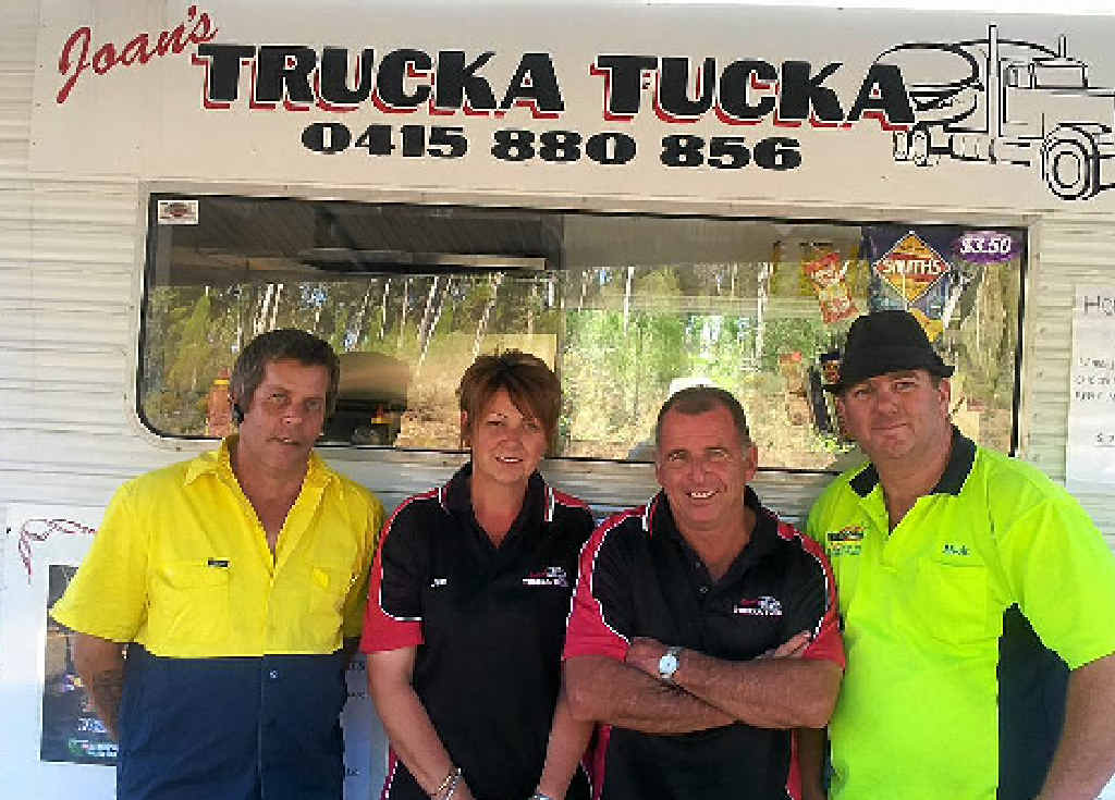 GRAB A FEED: Drivers Tom Buckler (left) and Michael Hogg (right) with Joan and Dave Redfern. GRAB A FEED: Drivers Tom Buckler (left) and Michael Hogg (right) with Joan and Dave Redfern.