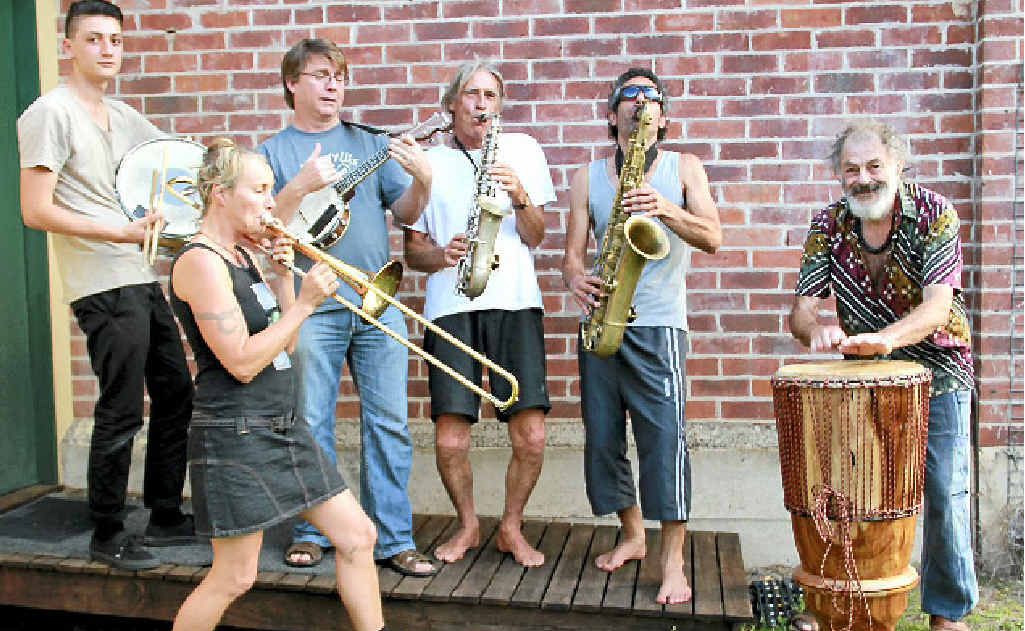 TUNING UP: Musicians rehearse for Sunday’s Mullum Music Festival’s street parade. TUNING UP: Musicians rehearse for Sunday’s Mullum Music Festival’s street parade.