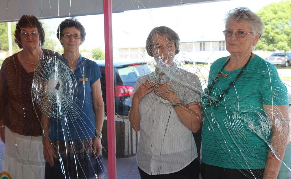 BITE THE HAND: Murgon Lifeline volunteers, Sylvia, Rhondda, Helen and Helene are saddened by the damage to the Christmas display after the window and door of Lifeline was destroyed on the weekend. BITE THE HAND: Murgon Lifeline volunteers, Sylvia, Rhondda, Helen and Helene are saddened by the damage to the Christmas display after the window and door of Lifeline was destroyed on the weekend.