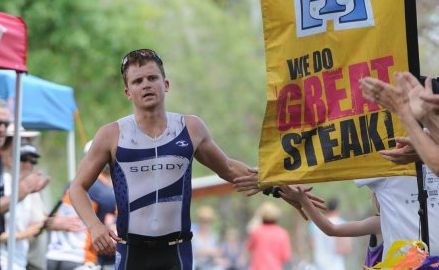 Brian McLeod celebrates just before crossing the finish line to win the Hervey Bay 100 on Sunday. Brian McLeod celebrates just before crossing the finish line to win the Hervey Bay 100 on Sunday.
