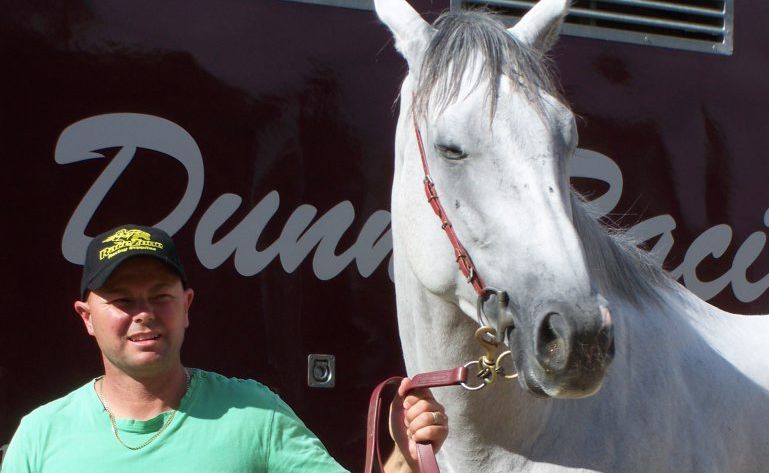 Trainer Matt Dunn and ghostly grey, The White Hope. Contributed / Daily News Trainer Matt Dunn and ghostly grey, The White Hope. Contributed / Daily News