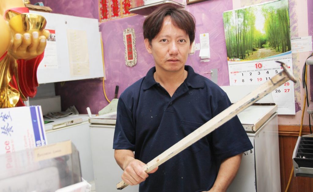 James Le-on from Silver Palace Chinese Restaurant at Redbank Plains fought off two men with a metal bar on Wednesday night. Photo: Inga Williams / The Satellite James Le-on from Silver Palace Chinese Restaurant at Redbank Plains fought off two men with a metal bar on Wednesday night. Photo: Inga Williams / The Satellite