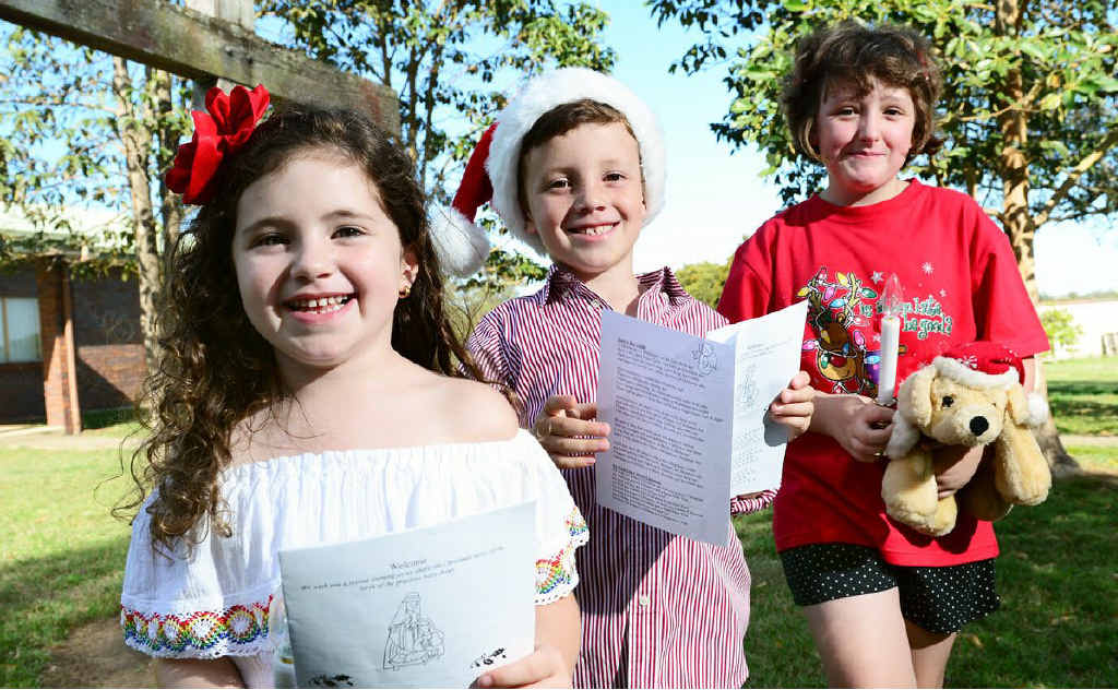LITTLE SINGERS: Starring at the Walloon carols (from left) are Abigail Ware, five, Oliver Ware, seven, and Ruby Lincoln, nine. LITTLE SINGERS: Starring at the Walloon carols (from left) are Abigail Ware, five, Oliver Ware, seven, and Ruby Lincoln, nine.
