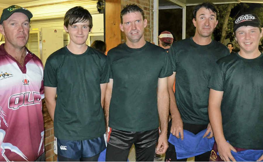 Warwick Touch Association president Grant Lollback with some of the Diehards team after a runner-up finish in B-grade mens' touch on Sunday. Warwick Touch Association president Grant Lollback with some of the Diehards team after a runner-up finish in B-grade mens' touch on Sunday.