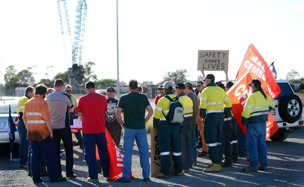 Union members protest on Port Central Way, Gladstone. Union members protest on Port Central Way, Gladstone.