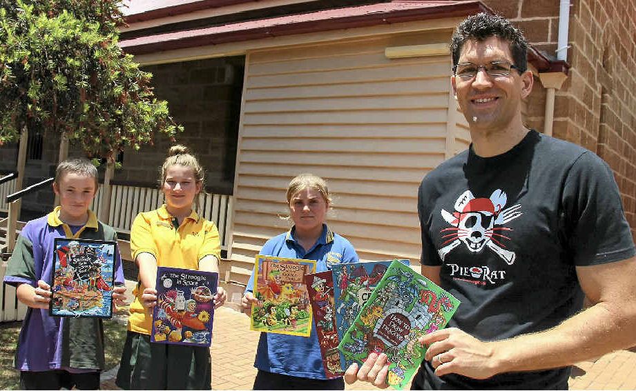 Well-known children’s author Cameron Stelzer (right) passed on some skills to primary school students at a workshop yesterday including (from left) Jayden Lamb, Amy Whear and Nikita Smith. Well-known children’s author Cameron Stelzer (right) passed on some skills to primary school students at a workshop yesterday including (from left) Jayden Lamb, Amy Whear and Nikita Smith.