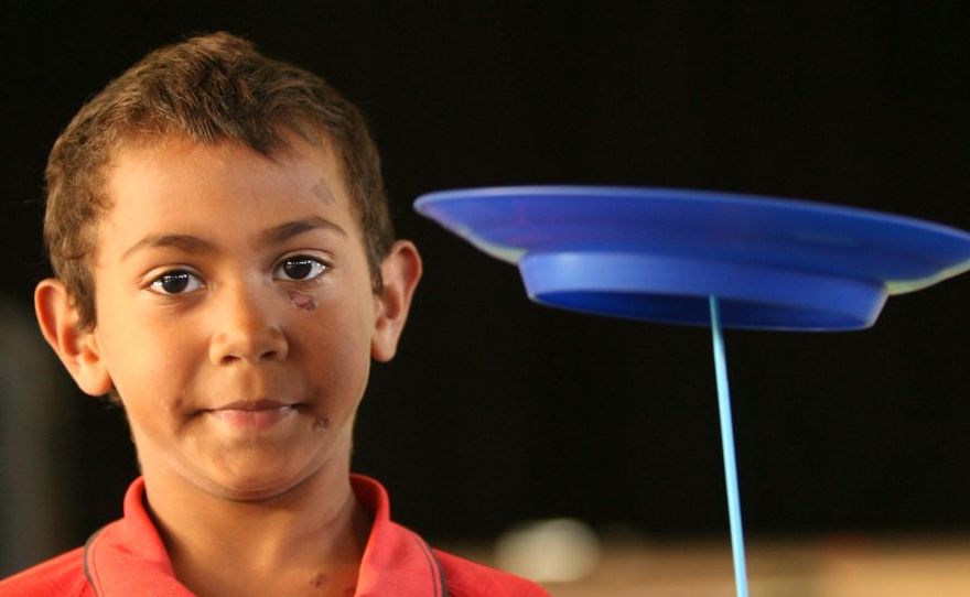 Angelo Hayden from Mount Morgan State School shows how to spin a plate after the Flipside Circus came to town and taught the kids a range of new tricks. Photo: Chris Ison / The Morning Bulletin Angelo Hayden from Mount Morgan State School shows how to spin a plate after the Flipside Circus came to town and taught the kids a range of new tricks. Photo: Chris Ison / The Morning Bulletin