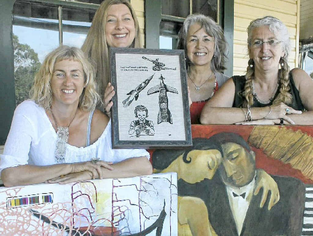 ARTY AMBITION: Showing off their artwork are Melinda Blair Paterson, Wendy Powitt and Jan Rae with Classic co-ordinator Tess Cullen (right). ARTY AMBITION: Showing off their artwork are Melinda Blair Paterson, Wendy Powitt and Jan Rae with Classic co-ordinator Tess Cullen (right).