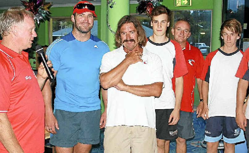 CLUB SUPPORT: Chairman Neil Armstrong (left) presents a sponsorship cheque to Byron Bay Cricket Club members for the 2012-2013 season. CLUB SUPPORT: Chairman Neil Armstrong (left) presents a sponsorship cheque to Byron Bay Cricket Club members for the 2012-2013 season.