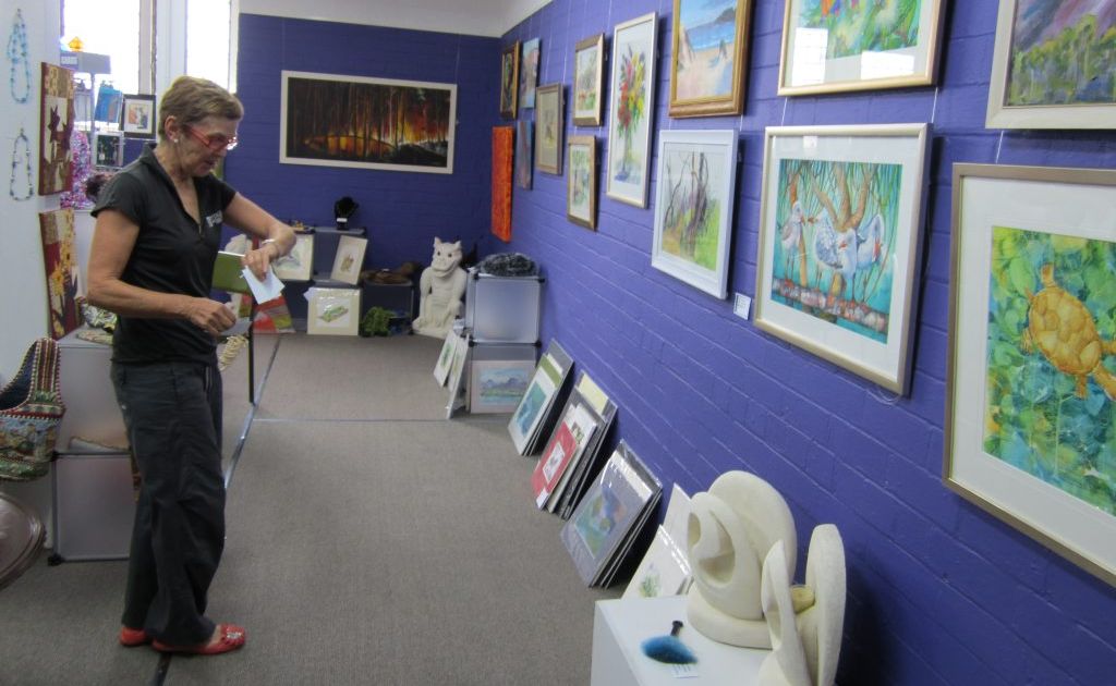 COMMUNITY ARTS ON GOONDOON: Shop coordinator Di Carey looks over the display in the retail gift shop. COMMUNITY ARTS ON GOONDOON: Shop coordinator Di Carey looks over the display in the retail gift shop.