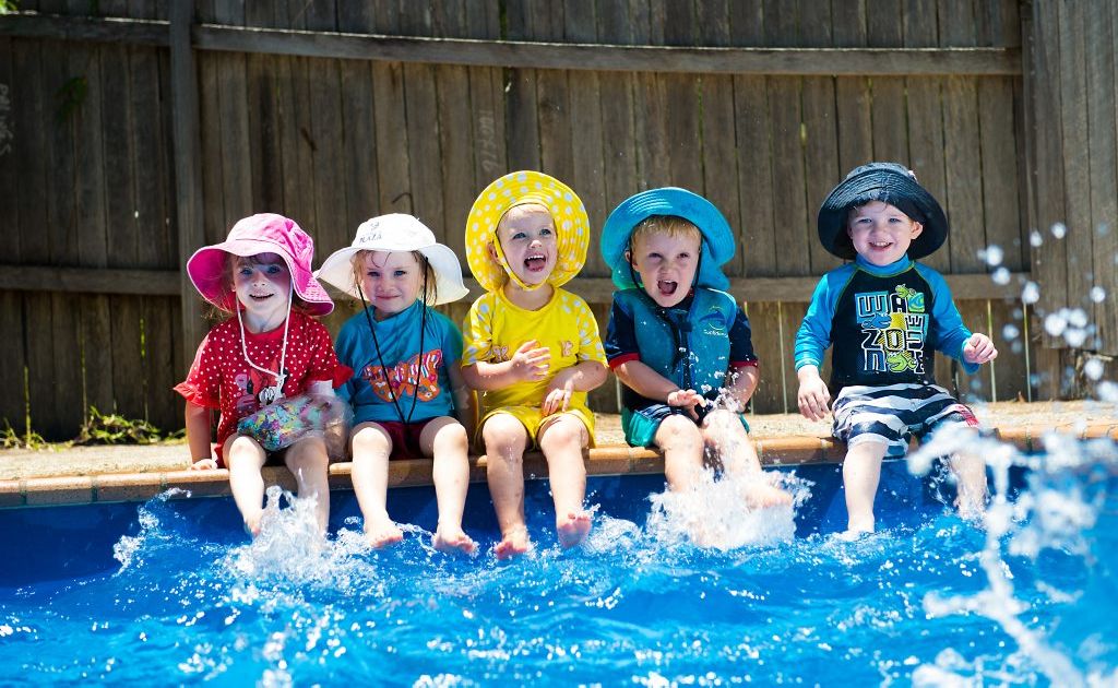 SPLASHING AROUND: Lily and Sophie Bourne, Savannah Newman-Doves, Oli Whitfield and Sam Greenshields get into the swing of summer. Photo: TREVOR VEALE SPLASHING AROUND: Lily and Sophie Bourne, Savannah Newman-Doves, Oli Whitfield and Sam Greenshields get into the swing of summer. Photo: TREVOR VEALE
