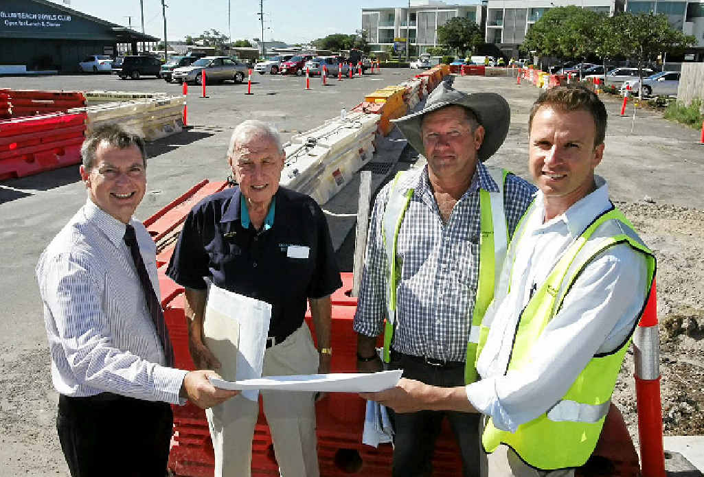 NEW LINK: Looking over plans for the streetscaping and access project. NEW LINK: Looking over plans for the streetscaping and access project.