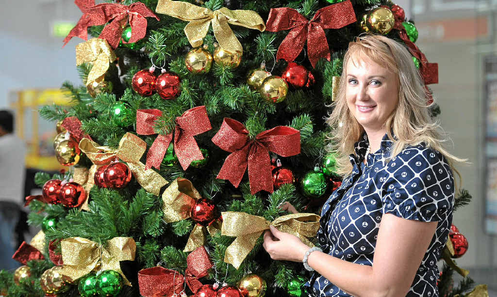 JOYOUS SONG: Cr Cheryl Bromage promoting the Brassall Christmas Carols in the park. JOYOUS SONG: Cr Cheryl Bromage promoting the Brassall Christmas Carols in the park.