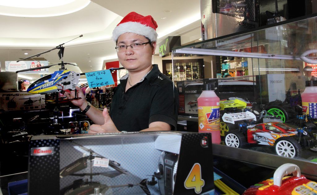 Mr Toys and Hobbies manager Jim Zhang is gearing up for Christmas sales. Photo: Inga Williams / The Reporter Mr Toys and Hobbies manager Jim Zhang is gearing up for Christmas sales. Photo: Inga Williams / The Reporter