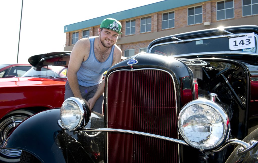 Shaun Devey admires a 1932 Ford. St Andrews Hospital Show and Shine. Photo Nev Madsen / The Chronicle Shaun Devey admires a 1932 Ford. St Andrews Hospital Show and Shine. Photo Nev Madsen / The Chronicle