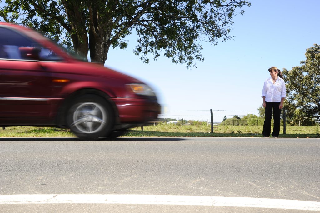 Gail Ryall, of Mountainview, at the spot on the Summerland Way where she nearly collided with school children crossing the road to their bus stop. Photo JoJo Newby / The Daily Examiner Gail Ryall, of Mountainview, at the spot on the Summerland Way where she nearly collided with school children crossing the road to their bus stop. Photo JoJo Newby / The Daily Examiner
