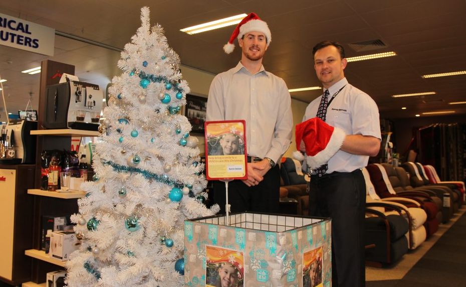 CHRISTMAS SPIRIT: Harvey Norman in Kingaroy are in the Christmas spirit and are collecting and adding to gifts for the Kids in Care Christmas Appeal for children in the South Burnett (from left) Ryan Freestone and Damian Corkett. CHRISTMAS SPIRIT: Harvey Norman in Kingaroy are in the Christmas spirit and are collecting and adding to gifts for the Kids in Care Christmas Appeal for children in the South Burnett (from left) Ryan Freestone and Damian Corkett.