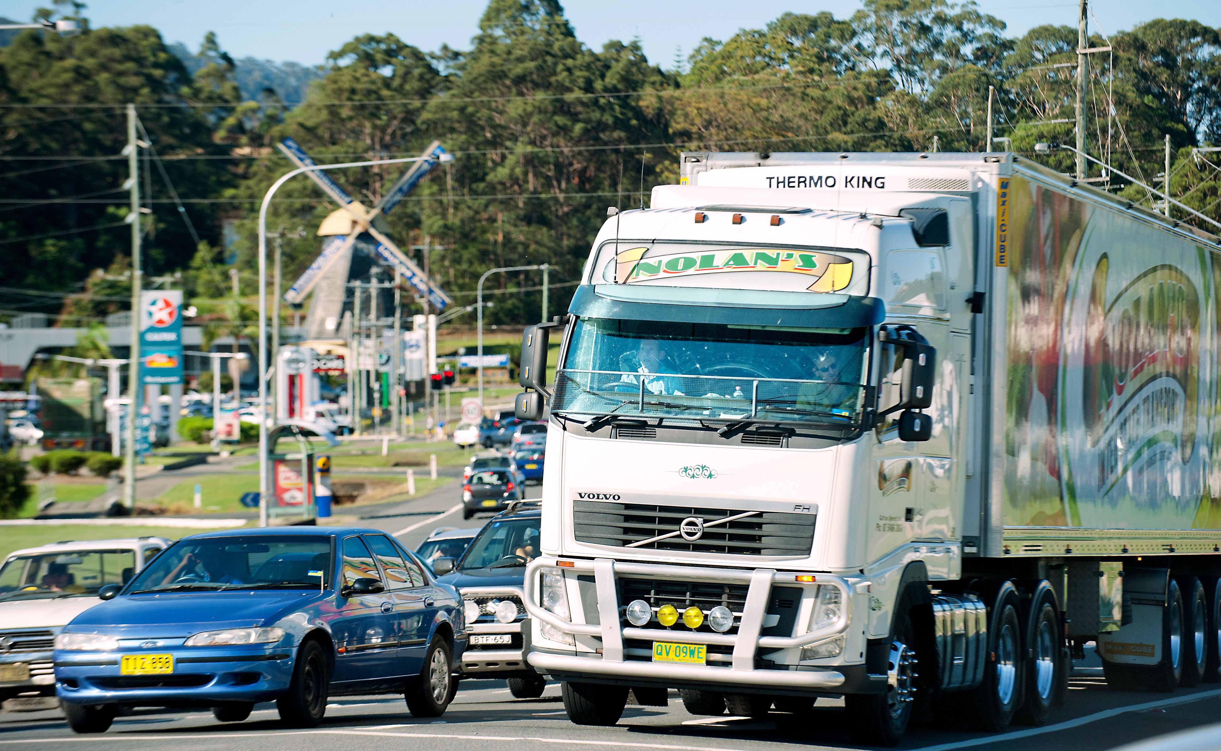 Opposition leader Tony Abbott drives a semi trailer through Coffs Harbour. Opposition leader Tony Abbott drives a semi trailer through Coffs Harbour.