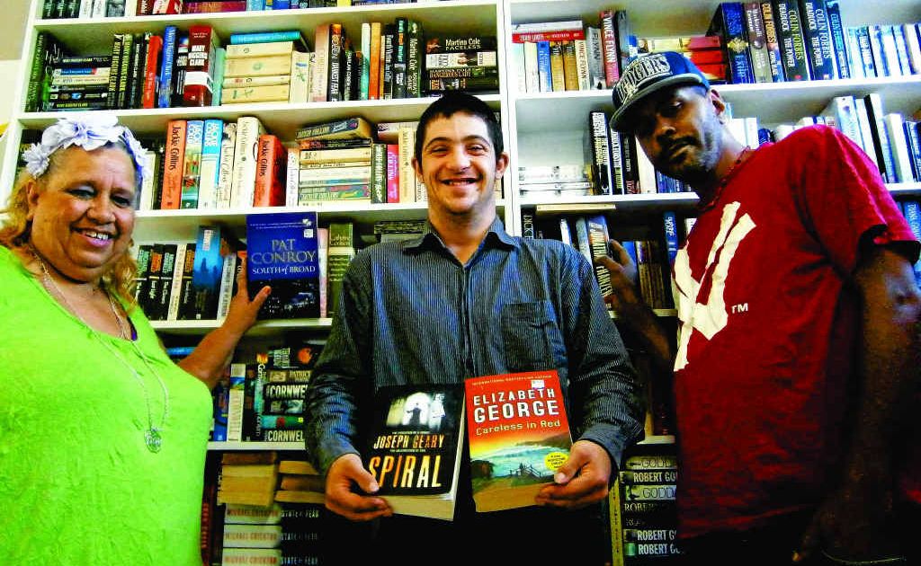 Celebrating the 40th birthday of Yellow Door Books and Gifts at Yeppoon are (from left) Janelle Havig, Rikki Gambin and Aaron Albury. Celebrating the 40th birthday of Yellow Door Books and Gifts at Yeppoon are (from left) Janelle Havig, Rikki Gambin and Aaron Albury.