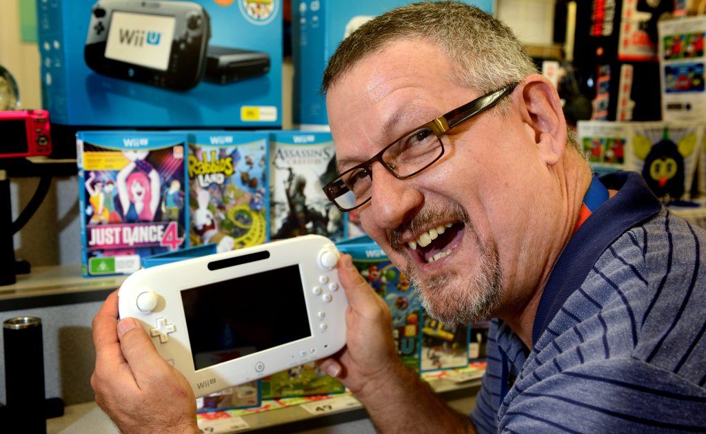 Tweed City Kmart general merchandise manager Randy Hays with the new WiiU. Tweed City Kmart general merchandise manager Randy Hays with the new WiiU.