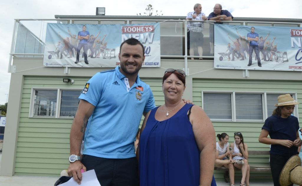 Beau Champion and Robyn Wonson in front of the completed work at Fingal Rovers. Beau Champion and Robyn Wonson in front of the completed work at Fingal Rovers.