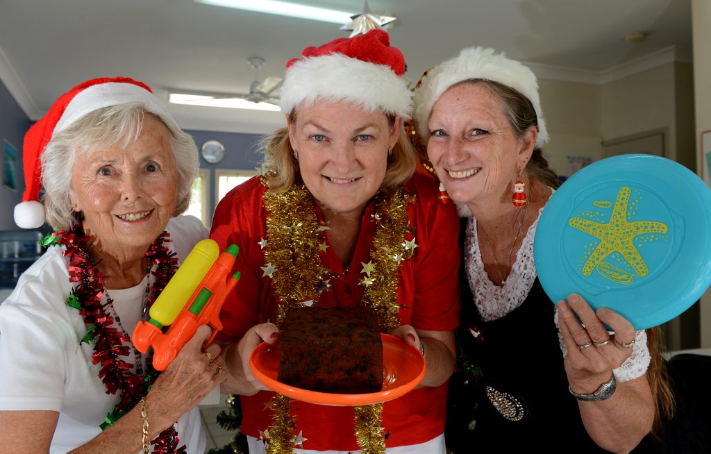Pat Tate, Kay Newman, Colleen Duncalfe getting ready for a Christmas Day party. Pat Tate, Kay Newman, Colleen Duncalfe getting ready for a Christmas Day party.