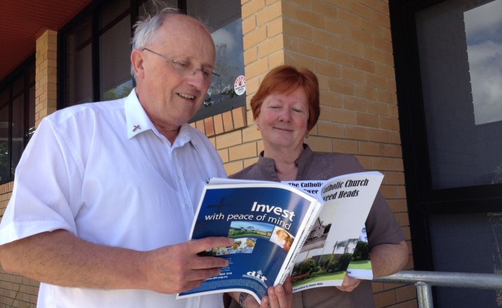 Father John Darbyshire and Di Millar reading a few facts about the church's history. Father John Darbyshire and Di Millar reading a few facts about the church's history.