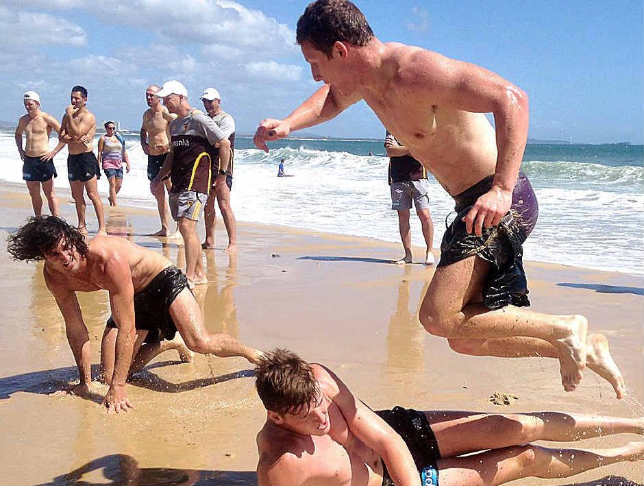 ALL A’FLUTTER: While Brendan Whitecross (in yellow) and Luke Bruest (inset) duke it out, the rest of the Hawks fly at Mooloolaba Beach yesterday. ALL A’FLUTTER: While Brendan Whitecross (in yellow) and Luke Bruest (inset) duke it out, the rest of the Hawks fly at Mooloolaba Beach yesterday.