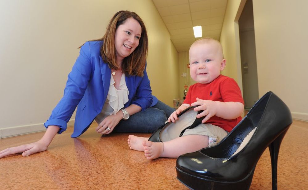 Marketing manager Erin Sorrensen wore heels up until she was eight months pregnant with her first child, Henry, when she started to feel her balance was affected by wearing the sky-high shoes. Marketing manager Erin Sorrensen wore heels up until she was eight months pregnant with her first child, Henry, when she started to feel her balance was affected by wearing the sky-high shoes.