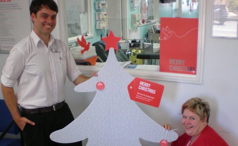BLOOD DONATION: Enrolled Nurse Robert Kelsey and Acting Donor Centre Manager Liz Matson putting their well wishes on the Christmas Tree at the Gladstone Blood Donor Centre. BLOOD DONATION: Enrolled Nurse Robert Kelsey and Acting Donor Centre Manager Liz Matson putting their well wishes on the Christmas Tree at the Gladstone Blood Donor Centre.