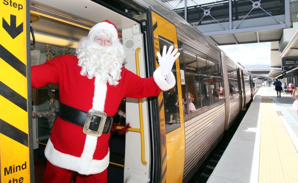 Santa arriving on the Santa Express at Richlands Station. Photo: Inga Williams / The Satellite Santa arriving on the Santa Express at Richlands Station. Photo: Inga Williams / The Satellite