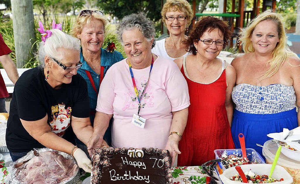 PARTY TIME: Volunteers congratulate Nancy Piggott on her birthday. PARTY TIME: Volunteers congratulate Nancy Piggott on her birthday.