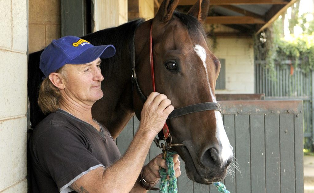 Toowoomba sprinter Azzaland with strapper Allan Miller at trainer Richie Stephenson's stable last year. Toowoomba sprinter Azzaland with strapper Allan Miller at trainer Richie Stephenson's stable last year.