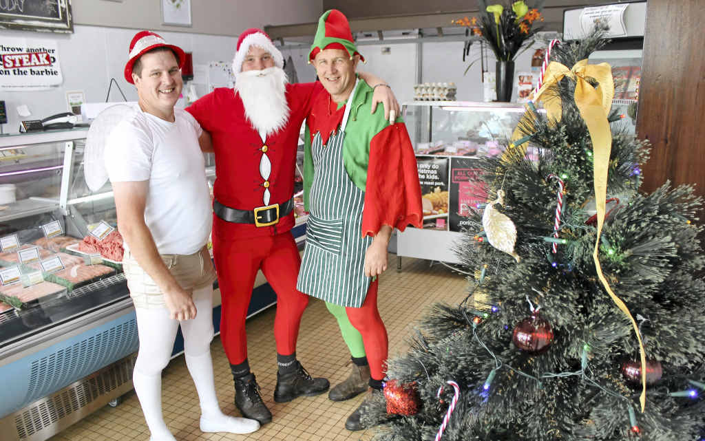 CHRISTMAS SPIRIT: Alstonville Quality Meats butchers (from left) Ashley Thomson, Will Finlay and Bruce Hall dressed up themselves as well as the business for the chamber of commerce competition. CHRISTMAS SPIRIT: Alstonville Quality Meats butchers (from left) Ashley Thomson, Will Finlay and Bruce Hall dressed up themselves as well as the business for the chamber of commerce competition.