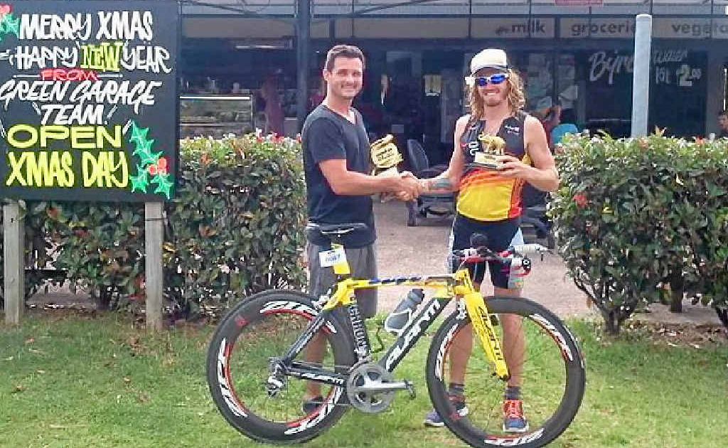 BOOST FOR BEN: Nathan Valentine (left) from the Green Garage and triathlete Ben Ferris. BOOST FOR BEN: Nathan Valentine (left) from the Green Garage and triathlete Ben Ferris.
