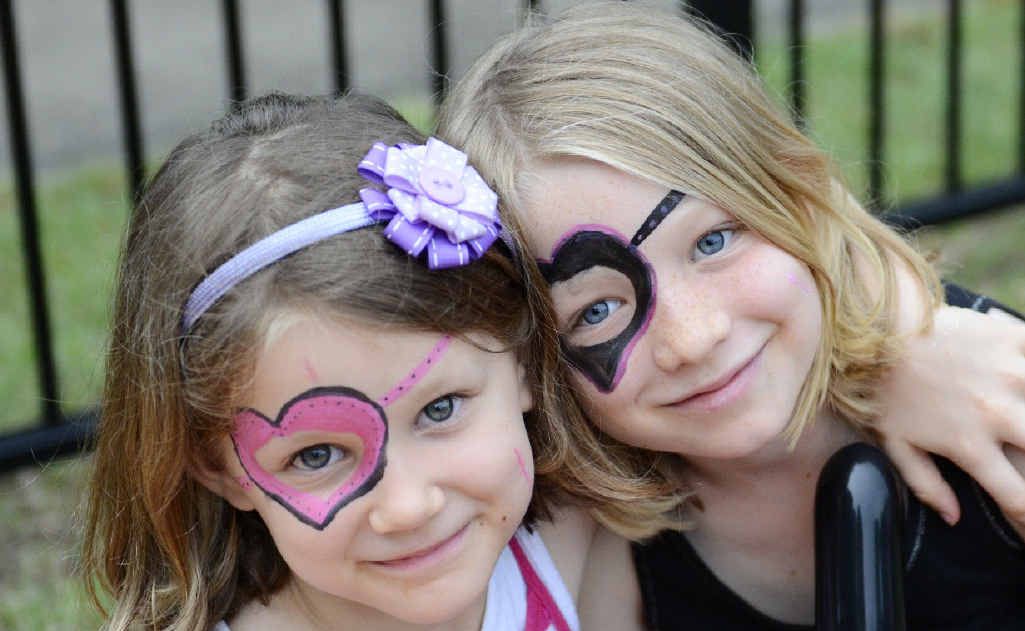 Emily, 5, and Leah, 8, Henderson get into the face painting at Carols on the Grass at the St Stephen’s Presbyterian Church at South Grafton. Photos: Debrah Novak Emily, 5, and Leah, 8, Henderson get into the face painting at Carols on the Grass at the St Stephen’s Presbyterian Church at South Grafton. Photos: Debrah Novak