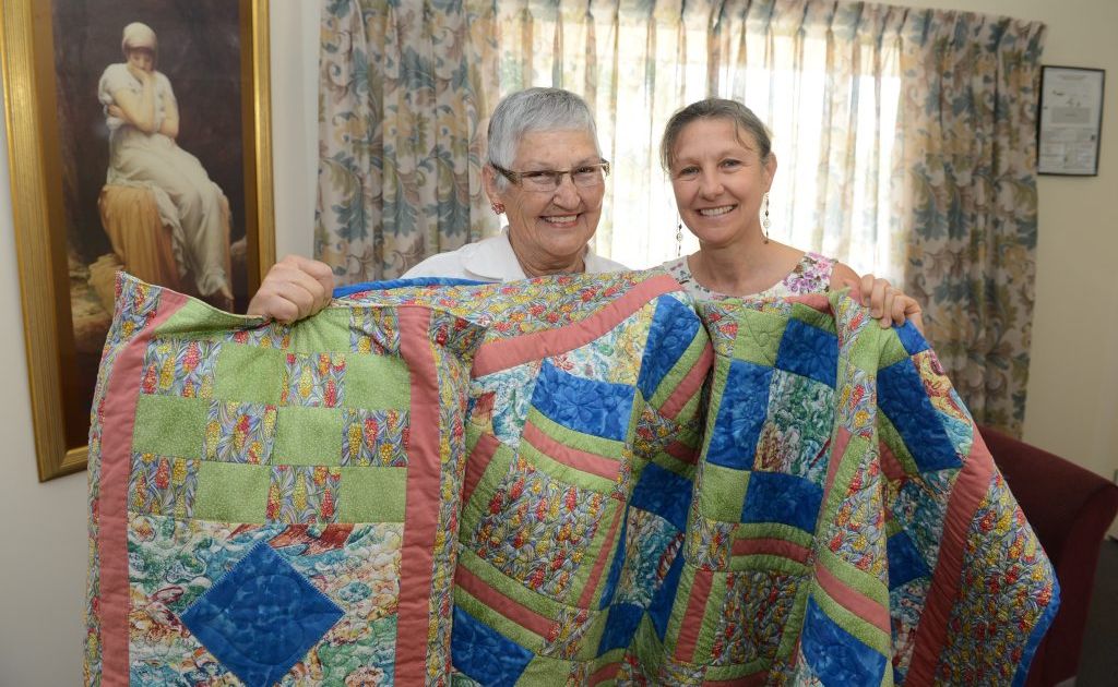 Hospice admininstration co-ordinator Karen Lavin (right) with Eileen Vass and her quilt that was raffled and money donated to Hospice Ipswich. Hospice admininstration co-ordinator Karen Lavin (right) with Eileen Vass and her quilt that was raffled and money donated to Hospice Ipswich.