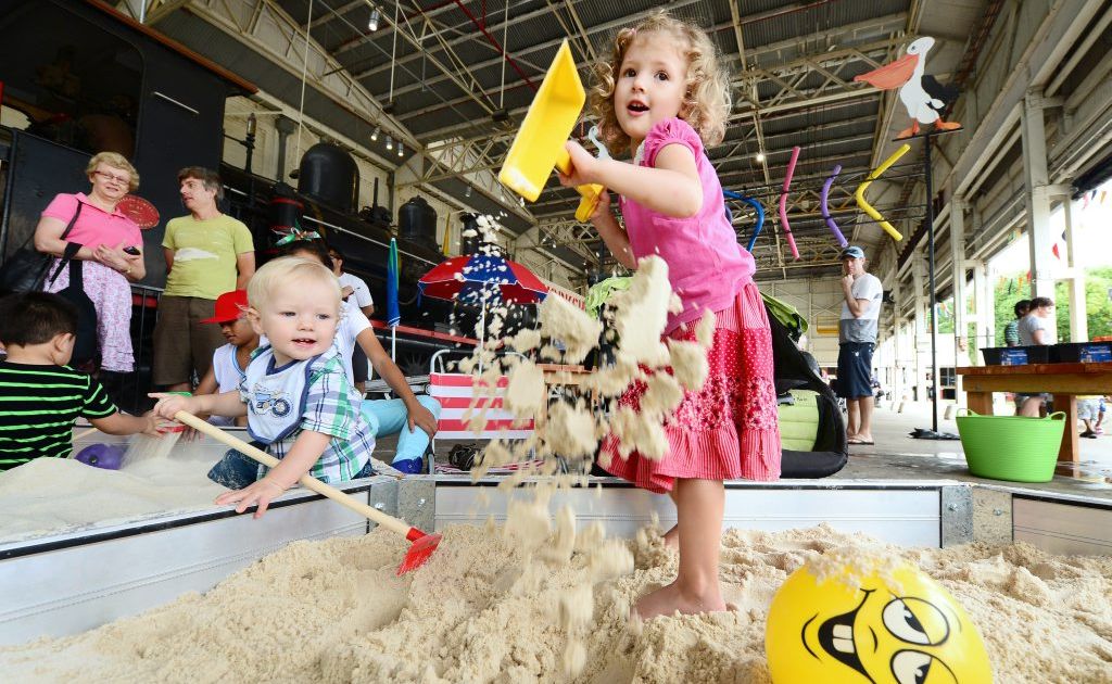 Sophie West, 3 and Ben West, 1, enjoyed the beach theme activities at the Railway Workshops Museum. Photo: David Nielsen / The Queensland Times Sophie West, 3 and Ben West, 1, enjoyed the beach theme activities at the Railway Workshops Museum. Photo: David Nielsen / The Queensland Times