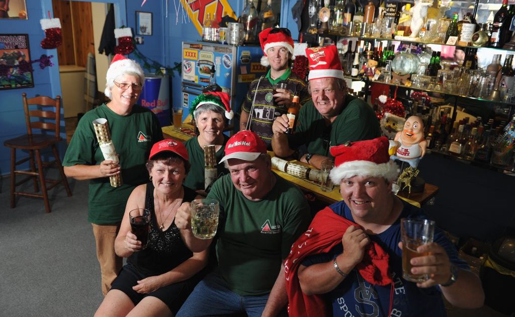 Christmas came late for Takura rural firefighters (back) Peter Murphy, Jack Luchjenbroers, (front) Jill Luchjenbroers, Sarah Murphy, Linda Rangeley, Ken Stanton and James Murphy who were among the numerous crews fighting the Black Swamp Creek fire on Christmas Day and Boxing Day. They are pictured celebrating in Ken Stanton's bar. Christmas came late for Takura rural firefighters (back) Peter Murphy, Jack Luchjenbroers, (front) Jill Luchjenbroers, Sarah Murphy, Linda Rangeley, Ken Stanton and James Murphy who were among the numerous crews fighting the Black Swamp Creek fire on Christmas Day and Boxing Day. They are pictured celebrating in Ken Stanton's bar.