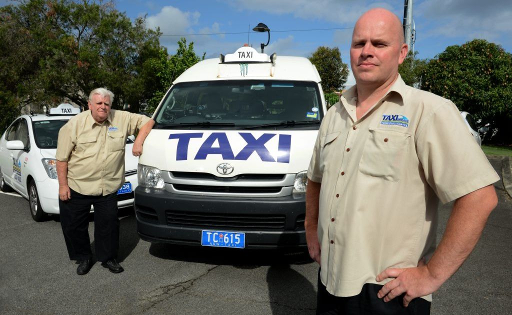 Drivers Brian Foster and Dean Matthews. No Taxi marshalls. Photo: John Gass / Daily News Drivers Brian Foster and Dean Matthews. No Taxi marshalls. Photo: John Gass / Daily News