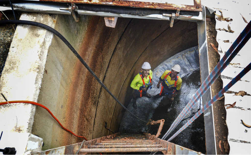 Kyle Watkins and Matt Bell of Clarence Valley Council work inside the Maclean Lookout reservoir yesterday without finding any contamination source. Kyle Watkins and Matt Bell of Clarence Valley Council work inside the Maclean Lookout reservoir yesterday without finding any contamination source.
