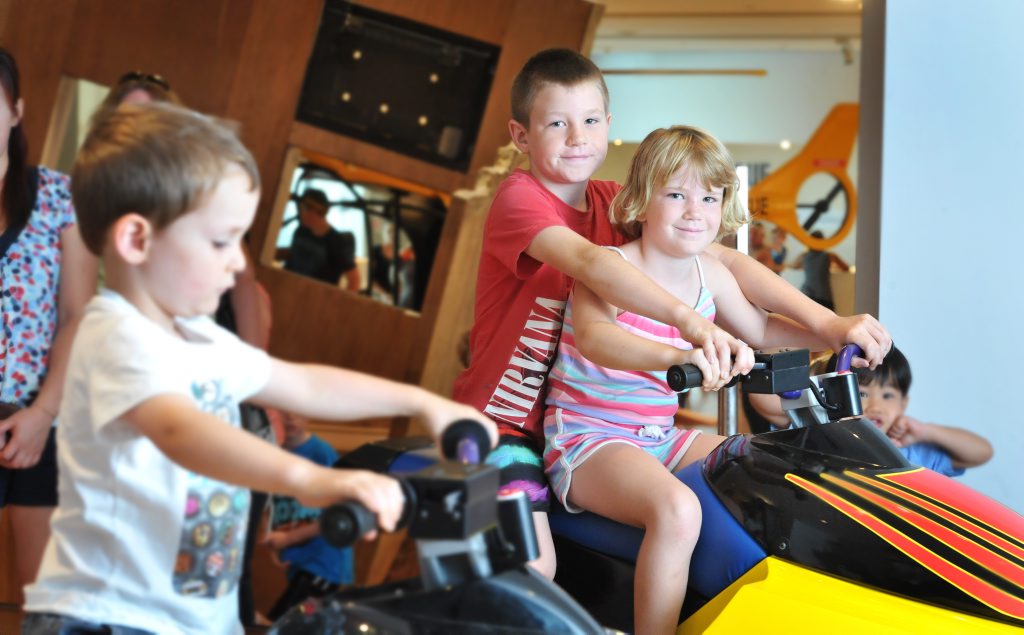 Mitchell Mann and Alicia Mann try out the jetski at the Ipswich Art Gallery Rescue exhibit which has received a record number of visitors. Photo: Rob Williams / The Queensland Times Mitchell Mann and Alicia Mann try out the jetski at the Ipswich Art Gallery Rescue exhibit which has received a record number of visitors. Photo: Rob Williams / The Queensland Times