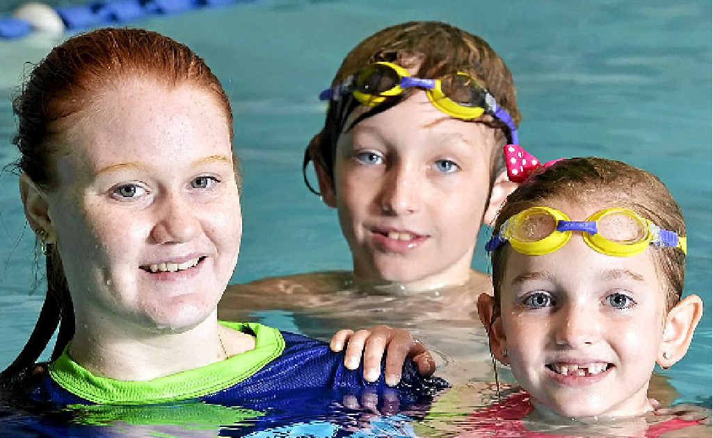 LEARNING EARLY: Lilly, 7, and Linkin Halliday, 9, with trainee swim instructor Dionne Buckely at McMahon’s Swim Factory. LEARNING EARLY: Lilly, 7, and Linkin Halliday, 9, with trainee swim instructor Dionne Buckely at McMahon’s Swim Factory.