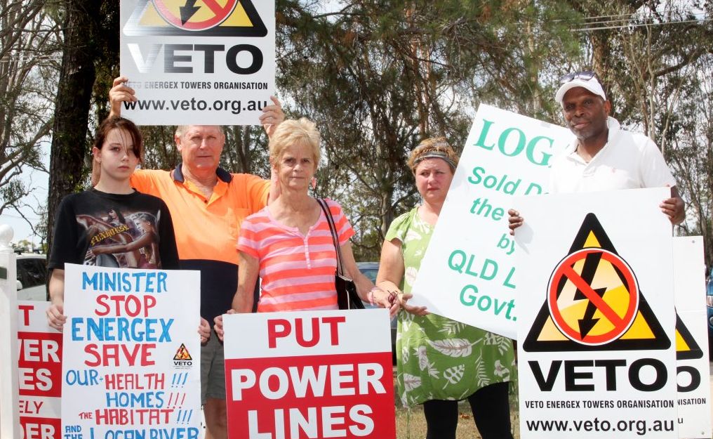 Belinda Coppock, 14, Peter Nash, Vivienne Buttigieg, Jane Dear and Aldwyn Rostant protesting against proposed powerlines in Logan Village. Photo: Inga Williams / The Reporter Belinda Coppock, 14, Peter Nash, Vivienne Buttigieg, Jane Dear and Aldwyn Rostant protesting against proposed powerlines in Logan Village. Photo: Inga Williams / The Reporter