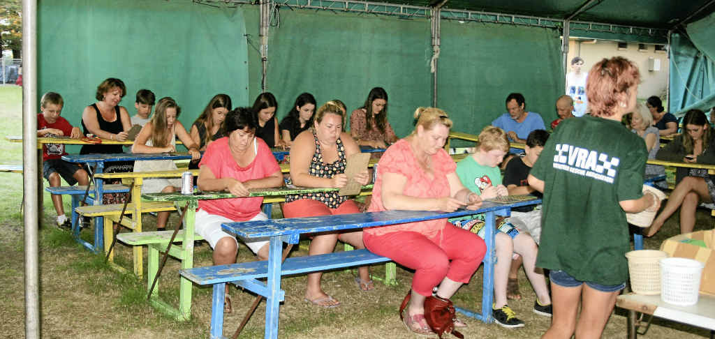 EYES ON THE PRIZE: Youngsters are filling the Housie tent in Brunswick Heads – and supporting the Volunteer Rescue Association at the same time. EYES ON THE PRIZE: Youngsters are filling the Housie tent in Brunswick Heads – and supporting the Volunteer Rescue Association at the same time.