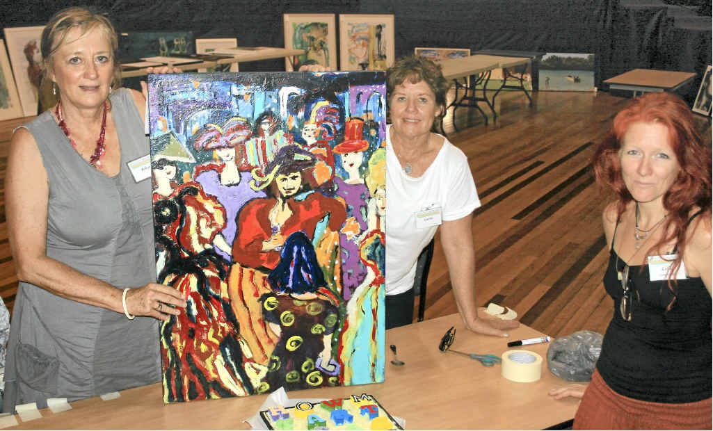 RAPT: Arts Classic volunteers Robyn Baker, Carol Coffey and Lelli Brown busy unwrapping artworks. RAPT: Arts Classic volunteers Robyn Baker, Carol Coffey and Lelli Brown busy unwrapping artworks.