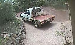Police are looking for an older model two-door Ford Courier with a bull bar and a distinctive red tray back following a ramming incident in Karalee. Police are looking for an older model two-door Ford Courier with a bull bar and a distinctive red tray back following a ramming incident in Karalee.