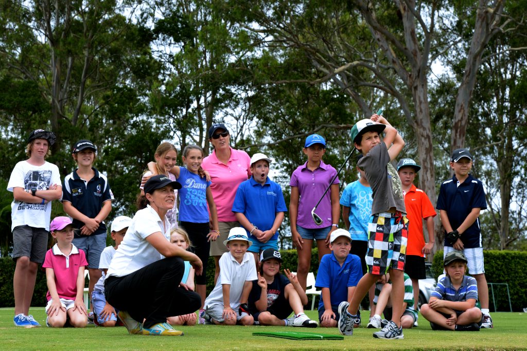 Rachel Hetherington works with 9 yo Jimmy Bourne at the kids golf clinic at Rachel Hetherington driving range. Photo: John Gass / Daily News Rachel Hetherington works with 9 yo Jimmy Bourne at the kids golf clinic at Rachel Hetherington driving range. Photo: John Gass / Daily News